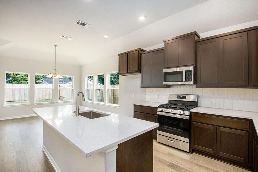 Furnished interior view inside a new home in , Bay City (Image 7). Furnished interior view inside a new home in , Bay City (Image 7).