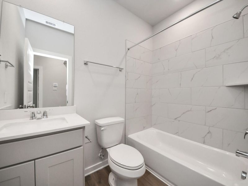 Furnished interior view inside a new home in Robins Landing, Houston (Image 17). Furnished interior view inside a new home in Robins Landing, Houston (Image 17).