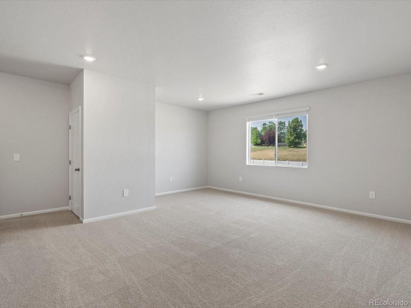 Spacious, unfurnished interior of a new home in Poudre Heights: The Alpine Collection, Windsor (Image 22).