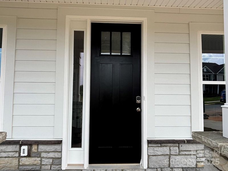 Front exterior of a new home in , Sherrills Ford, NC, highlighting curb appeal (Image 1).