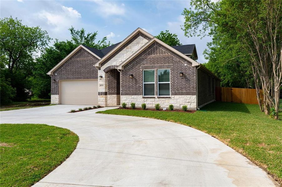 Front exterior of a new home in , Garland, TX, highlighting curb appeal (Image 19).