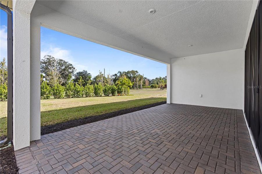 Exterior details and patio area of a home in Woodland Preserve, Parrish (Image 4).