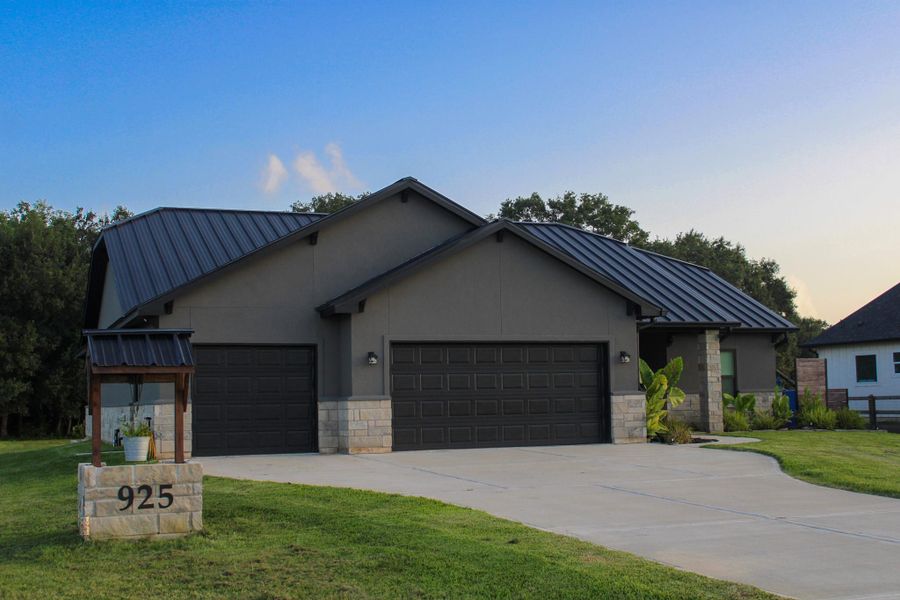 Front exterior of a new home in , Angleton, TX, highlighting curb appeal (Image 1). Front exterior of a new home in , Angleton, TX, highlighting curb appeal (Image 1).