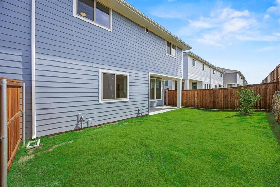 Front exterior of a new home in North Square at Uptown, Celina, TX, highlighting curb appeal (Image 2). Front exterior of a new home in North Square at Uptown, Celina, TX, highlighting curb appeal (Image 2).