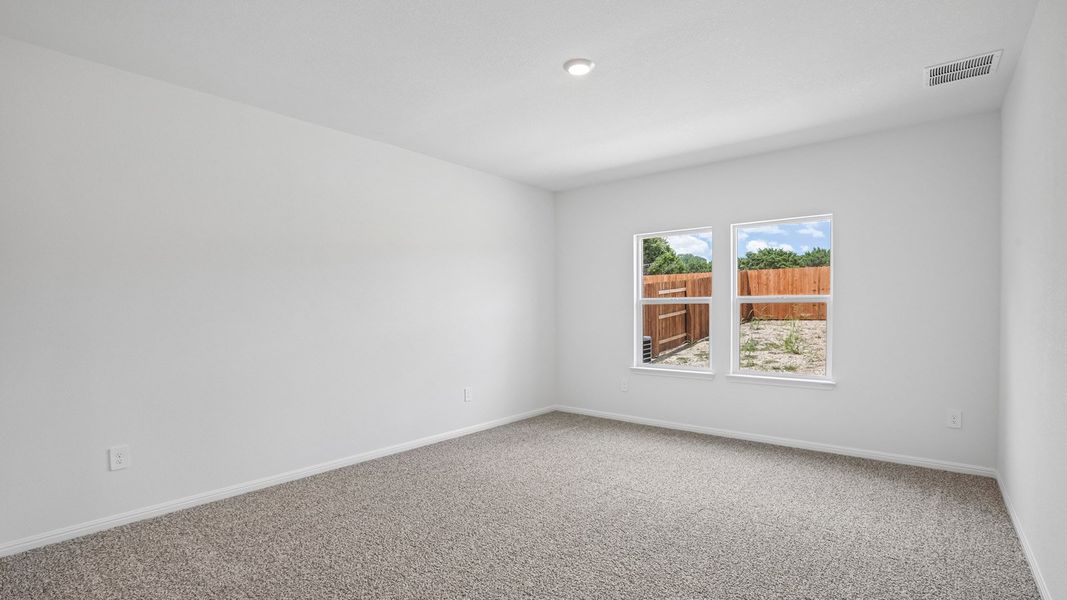 Spacious, unfurnished interior of a new home in Bar W Ranch, Leander (Image 22).