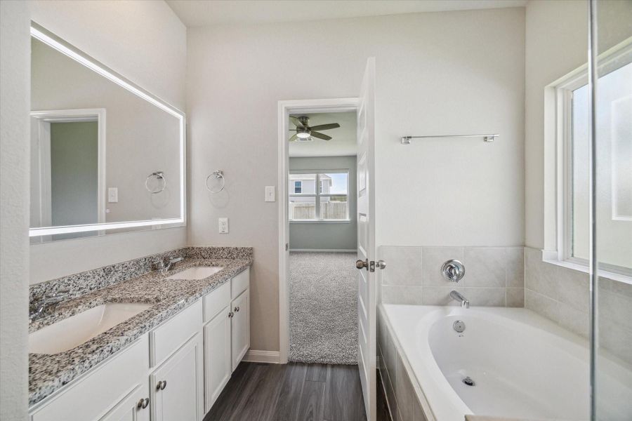 Furnished interior view inside a new home in Townsend Reserve, Splendora (Image 9).