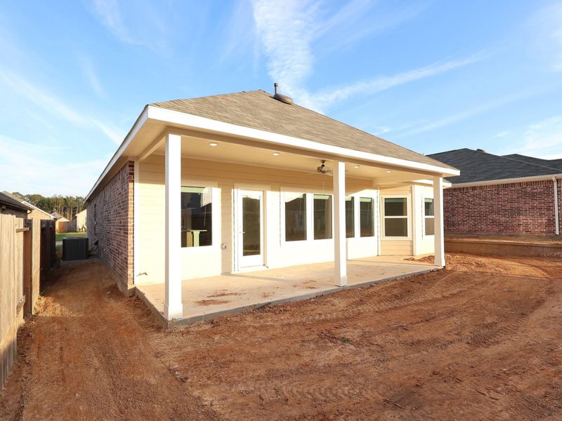 Exterior details and patio area of a home in Magnolia Ridge, Magnolia (Image 3).