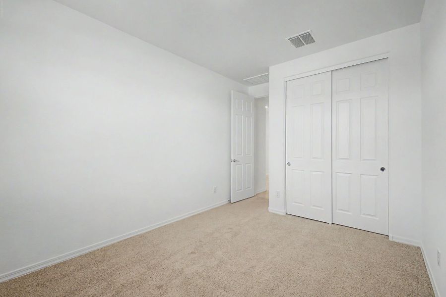 Spacious, unfurnished interior of a new home in Tyler Ranch, Buckeye (Image 13).