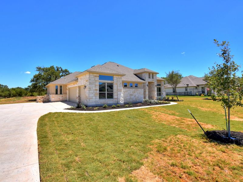 Representative exterior photo of a completed home built from the San Simeon I by Giddens Homes in Clearwater Ranch, Liberty Hill, TX (Image 38).
