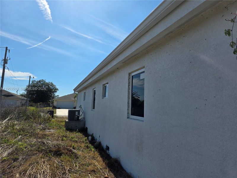 Exterior details and patio area of a home in , Lehigh Acres (Image 3).