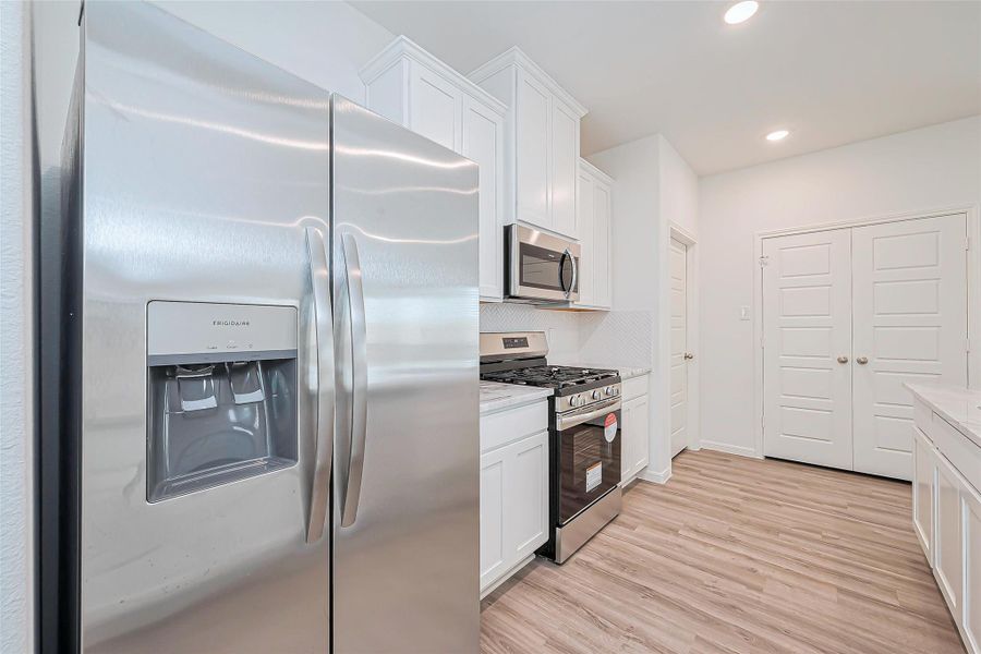 Furnished interior view inside a new home in Enclave at Willis, Willis (Image 5).