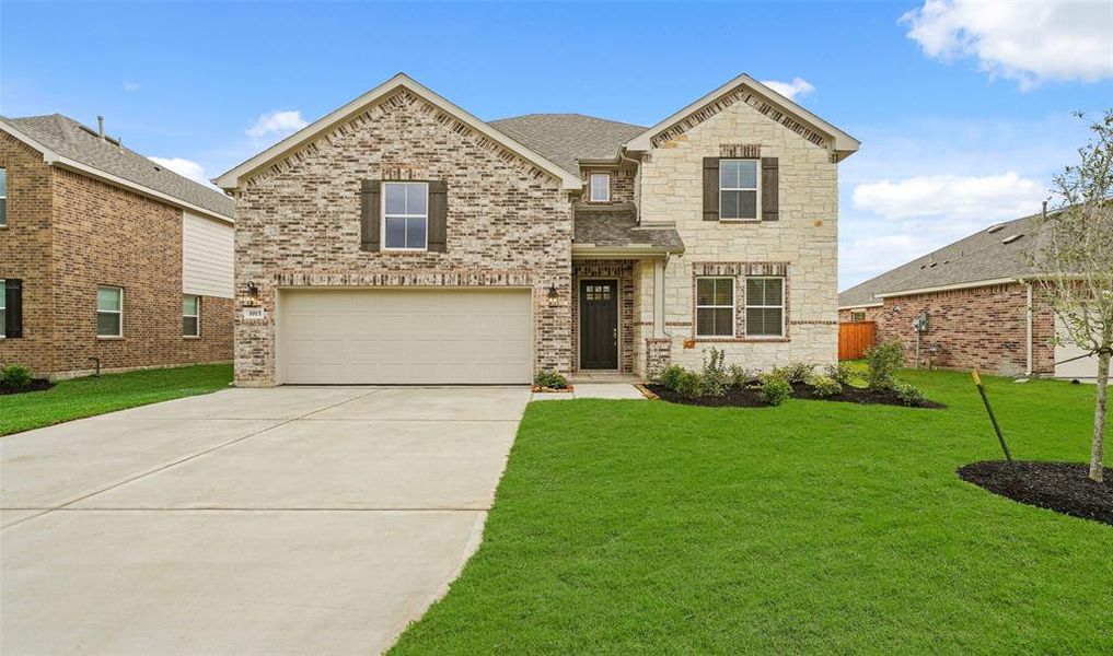 Stunning Omaha home design with elevation RA built by K. Hovnanian Homes in beautiful Centennial Oaks.