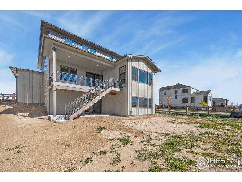 Exterior details and patio area of a home in Kitchel Lake at Serratoga Falls, Timnath (Image 2).