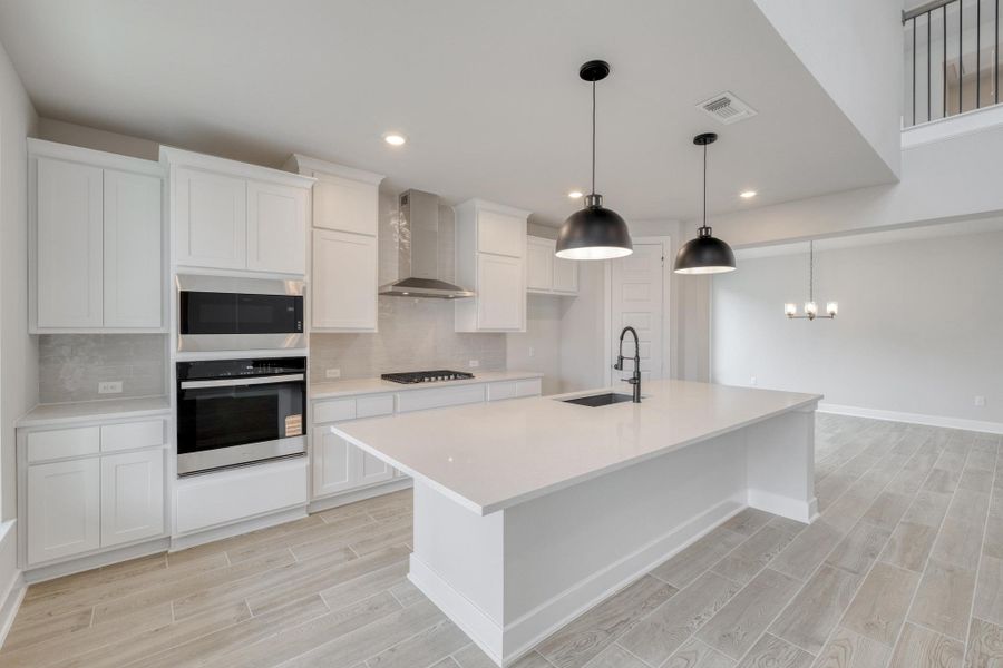 Furnished interior view inside a new home in The Colony, Bastrop (Image 7).
