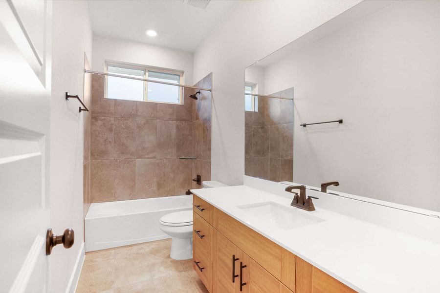 Representative furnished interior of a home built from the Cornell – 60′ Lot by Chesmar Homes in Lakes of Cane Island, Katy (Image 8).