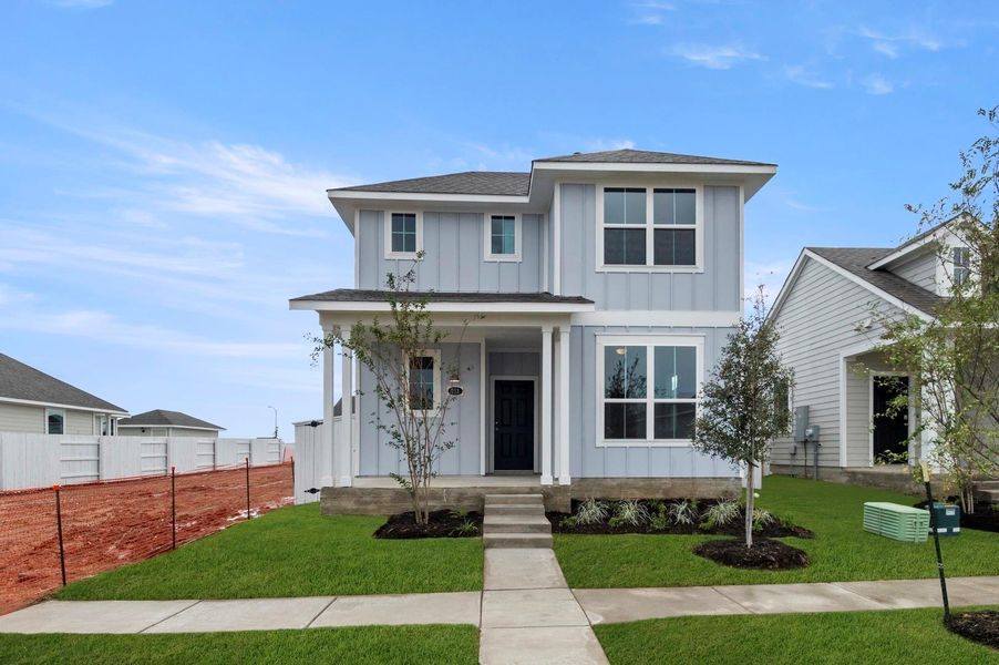Front exterior of a new home in Harvest Ridge, Elgin, TX, highlighting curb appeal (Image 18).