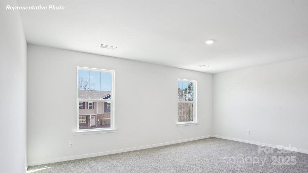 Spacious, unfurnished interior of a new home in Reedy Creek Preserve, Charlotte (Image 20).