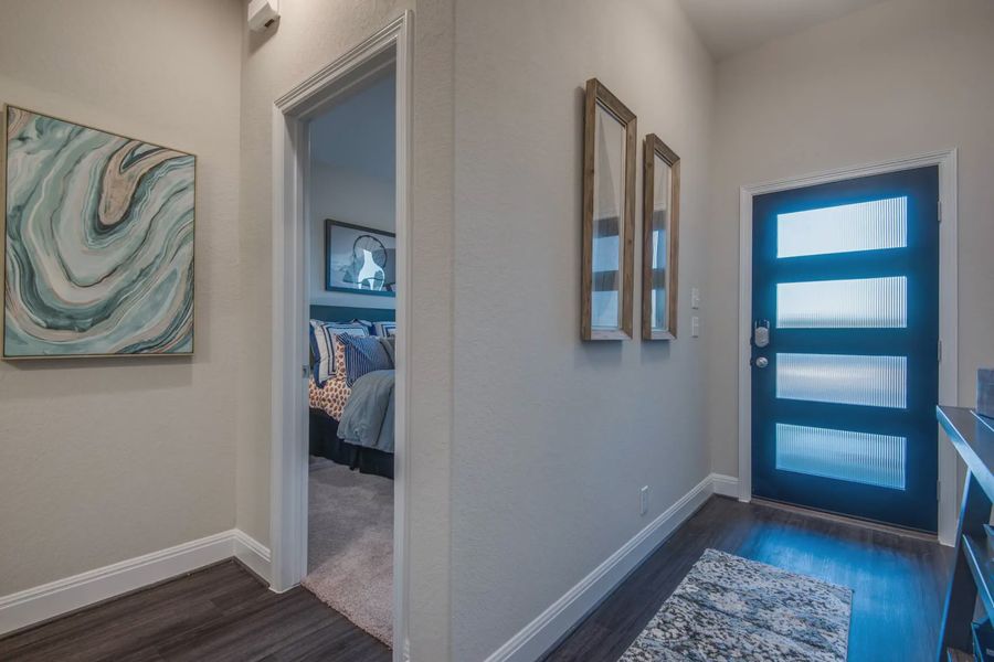 Representative furnished interior of a home built from the Asher by Chesmar Homes in Buffalo Crossing, Cibolo (Image 6).
