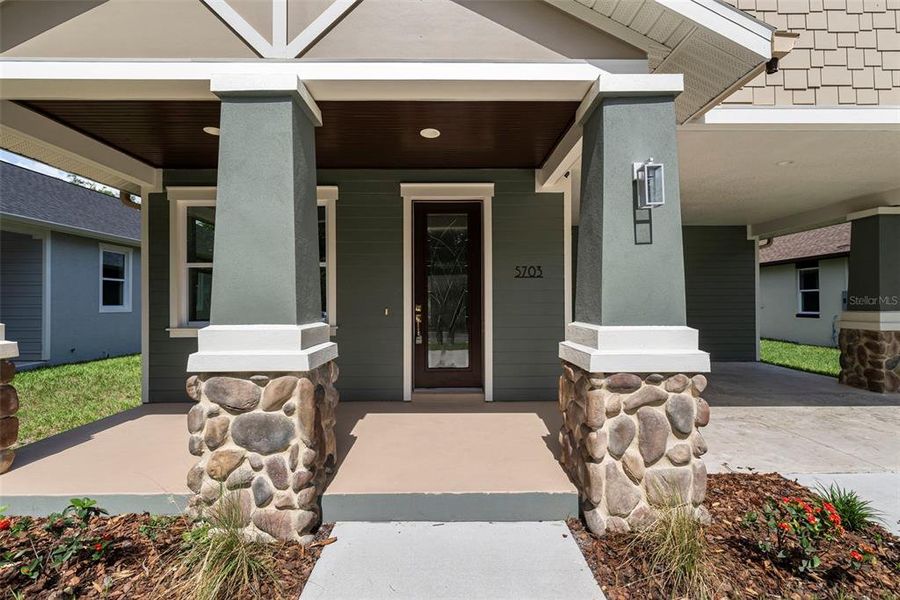 Front exterior of a new home in , Tampa, FL, highlighting curb appeal (Image 17). Front exterior of a new home in , Tampa, FL, highlighting curb appeal (Image 17).
