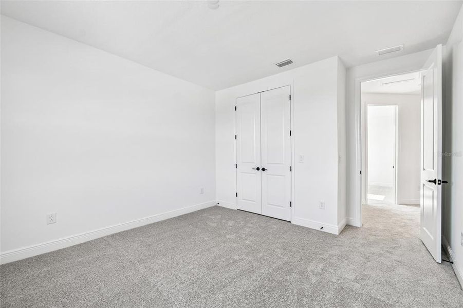 Spacious, unfurnished interior of a new home in Creeks Edge at Twin Rivers, Parrish (Image 23).