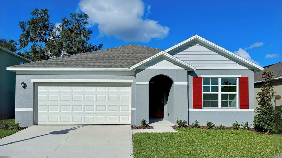 Front exterior of a new home in Fountain View, Ormond Beach, FL, highlighting curb appeal (Image 2).