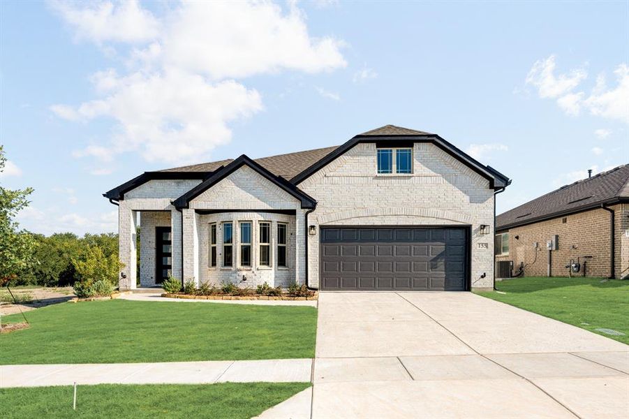 Front exterior of a new home in Bear Creek Elements, Lavon, TX, highlighting curb appeal (Image 1). Front exterior of a new home in Bear Creek Elements, Lavon, TX, highlighting curb appeal (Image 1).