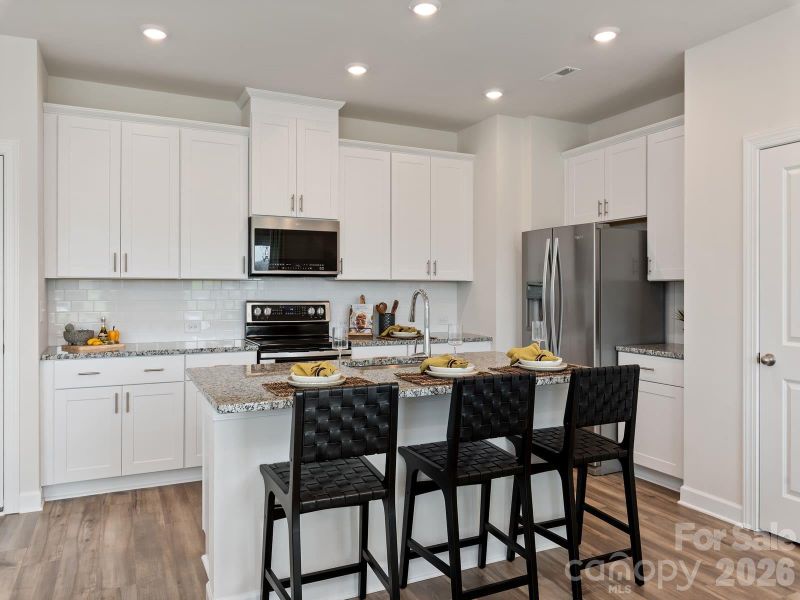 Photo is not of the actual home, but is an inspirational photo of builder’s model home and may depict options, furnishings, and/or decorator features that are not included