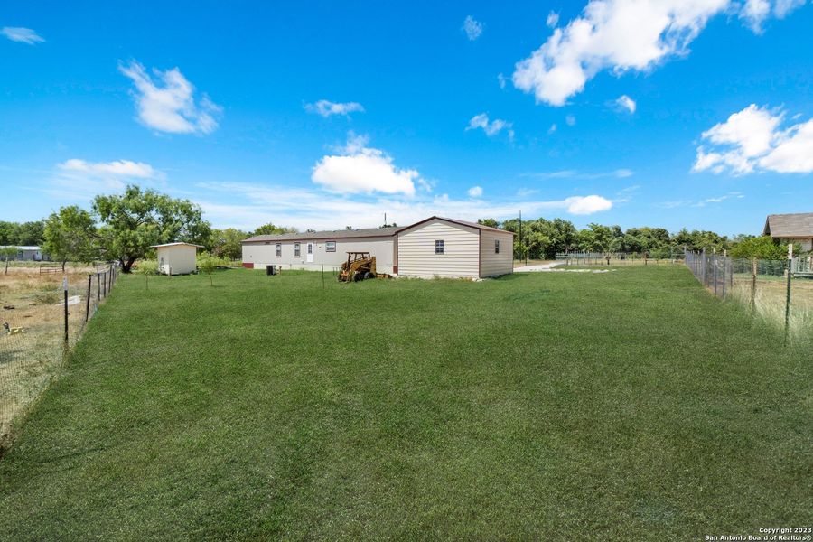 Front exterior of a new home in , Atascosa, TX, highlighting curb appeal (Image 18). Front exterior of a new home in , Atascosa, TX, highlighting curb appeal (Image 18).