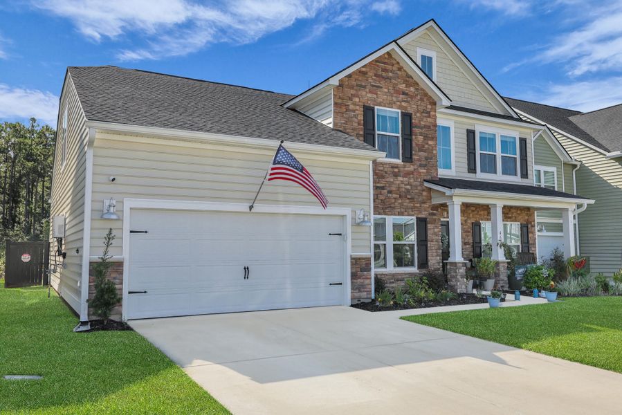 Front exterior of a new home in , Summerville, SC, highlighting curb appeal (Image 19). Front exterior of a new home in , Summerville, SC, highlighting curb appeal (Image 19).