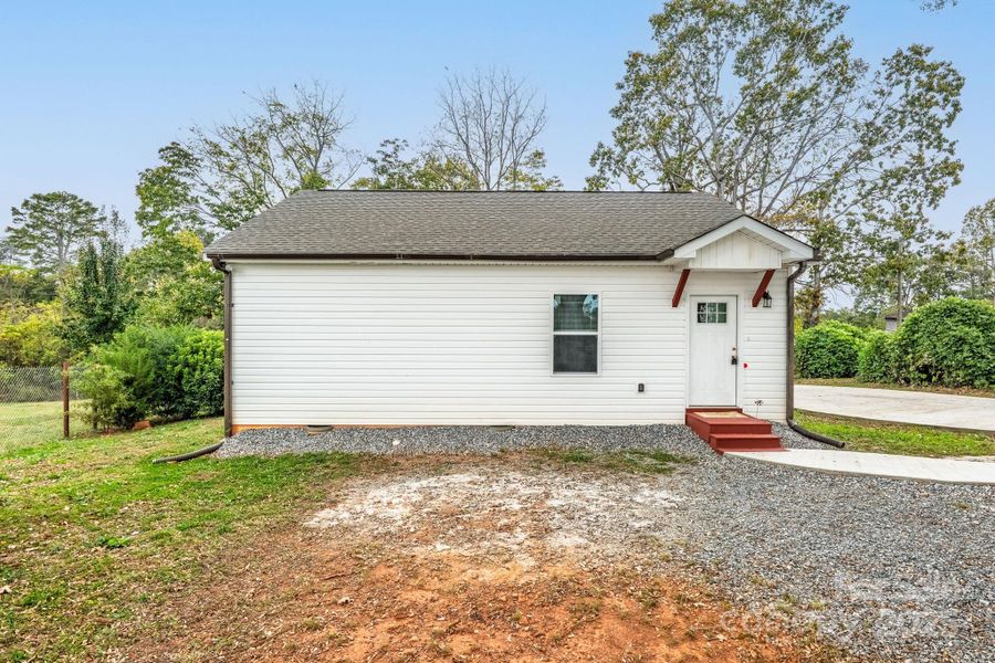 Exterior details and patio area of a home in , Spindale (Image 21).