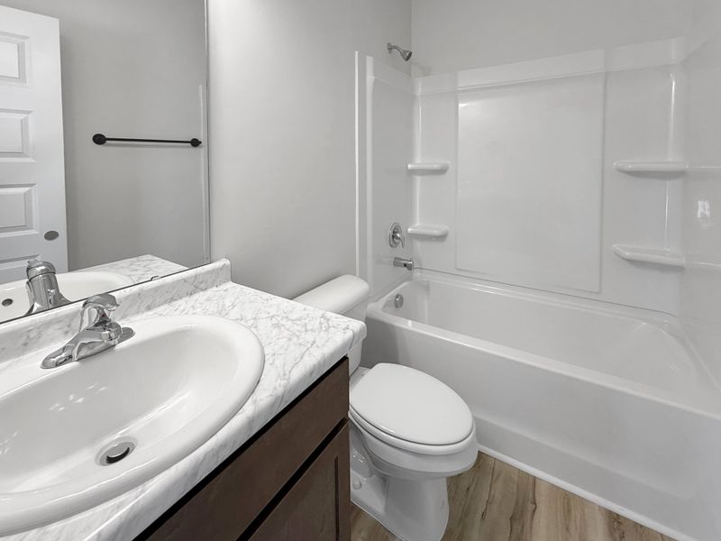 Furnished interior view inside a new home in The Village at Sassafras, Allenhurst (Image 9).