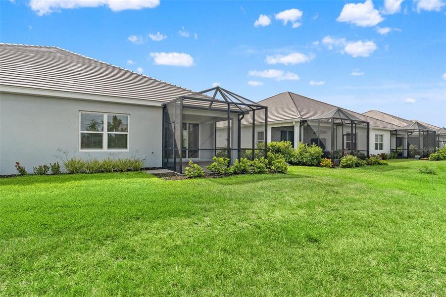 Exterior details and patio area of a home in Wysteria, Venice (Image 4).