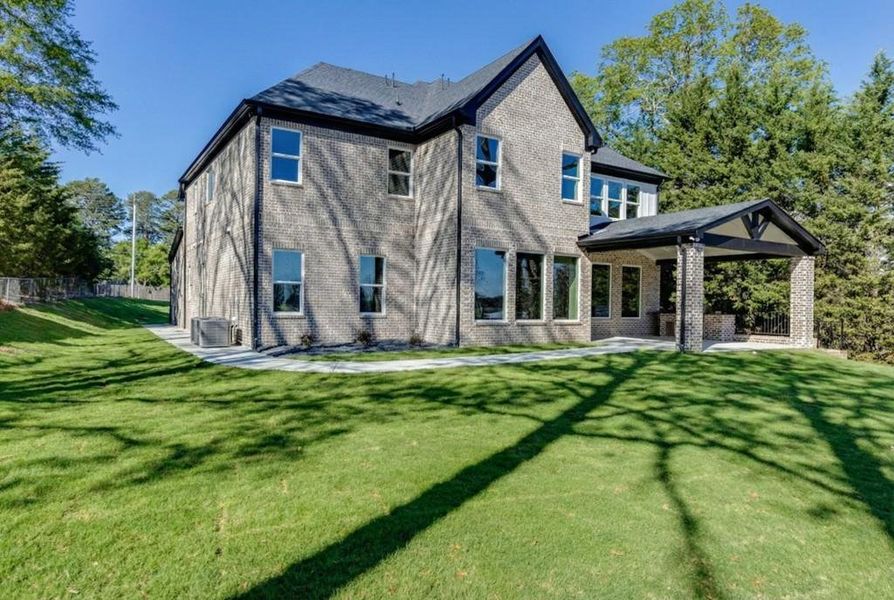 Exterior details and patio area of a home in , Buford (Image 27).