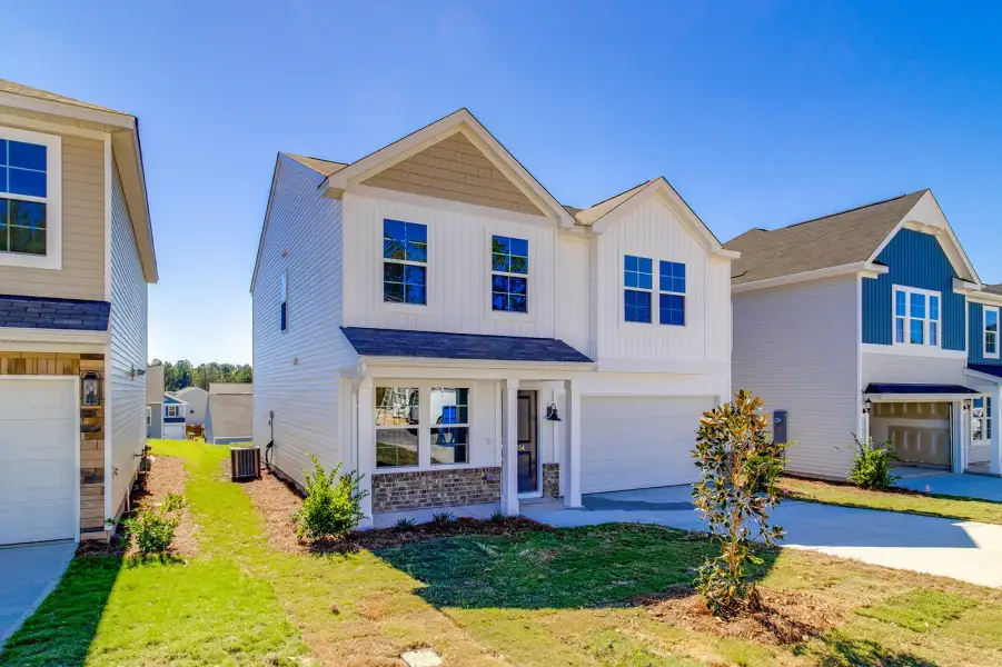 Front exterior of a new home in Bluefield, Lexington, SC, highlighting curb appeal (Image 21).