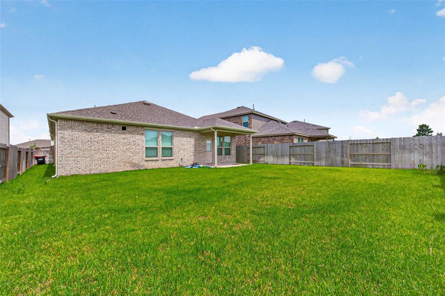 Exterior details and patio area of a home in Marvida, Cypress (Image 31).
