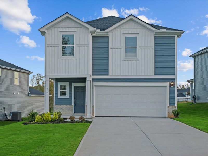Front exterior of a new home in The Farm at Wells Creek - Heritage Collection, Gray Court, SC, highlighting curb appeal (Image 1). Front exterior of a new home in The Farm at Wells Creek - Heritage Collection, Gray Court, SC, highlighting curb appeal (Image 1).