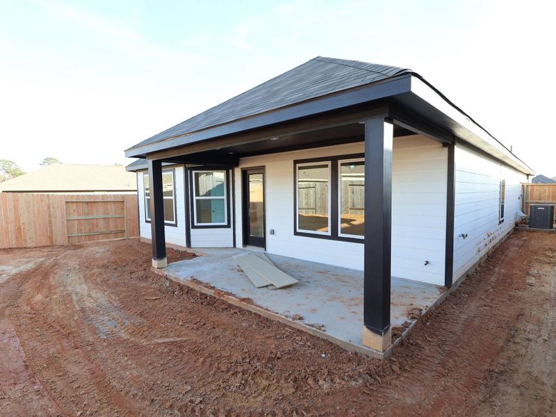 Exterior details and patio area of a home in Magnolia Ridge, Magnolia (Image 22). Exterior details and patio area of a home in Magnolia Ridge, Magnolia (Image 22).