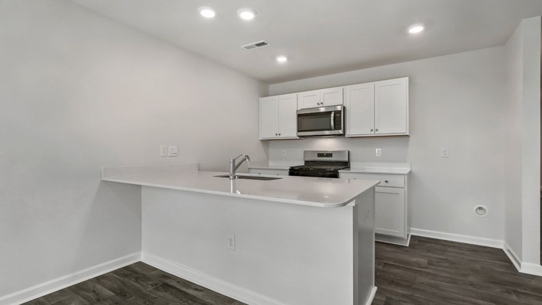 Furnished interior view inside a new home in The Townes at Honeycutt Oaks, Angier (Image 8).