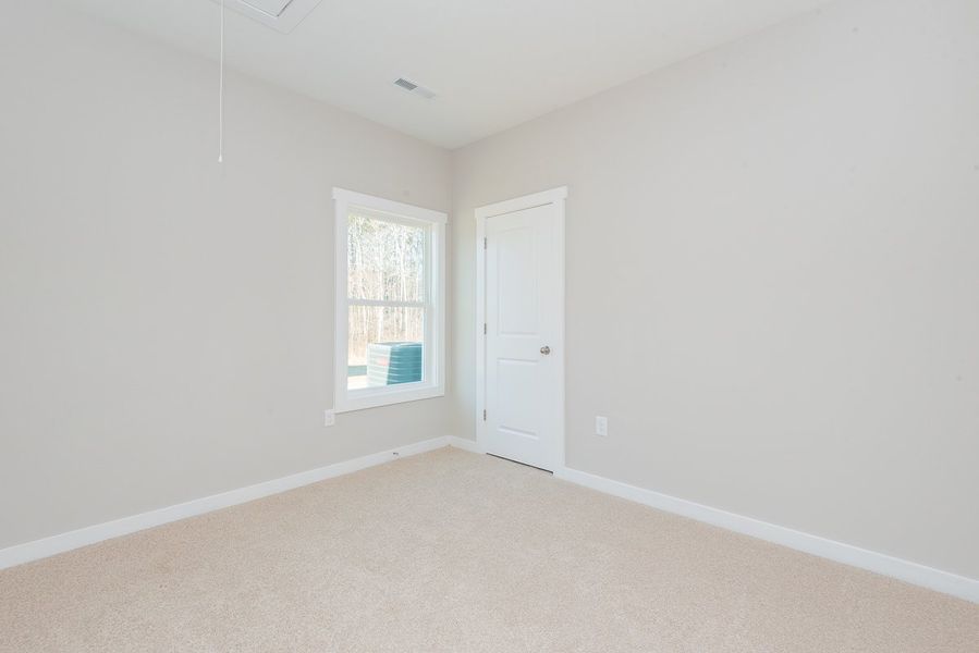 Representative unfurnished interior of a home built from the Dogwood by Foundation Home Builders LLC in Pinnix Loop, Burlington (Image 17). Representative unfurnished interior of a home built from the Dogwood by Foundation Home Builders LLC in Pinnix Loop, Burlington (Image 17).