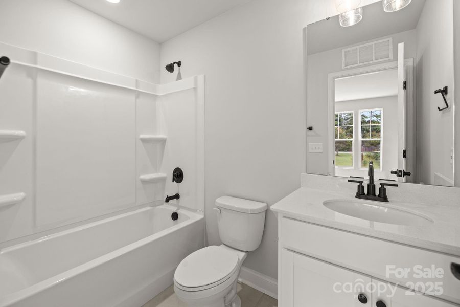 Bonus full bath above garage Bonus full bath above garage