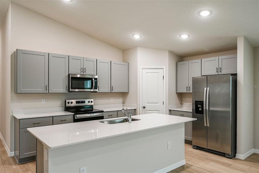 Furnished interior view inside a new home in Scenic Terrace, Haines City (Image 7).