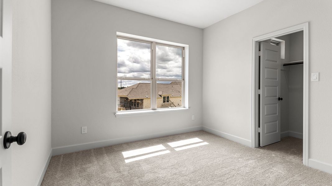 Spacious, unfurnished interior of a new home in Meridiana, Manvel (Image 14).