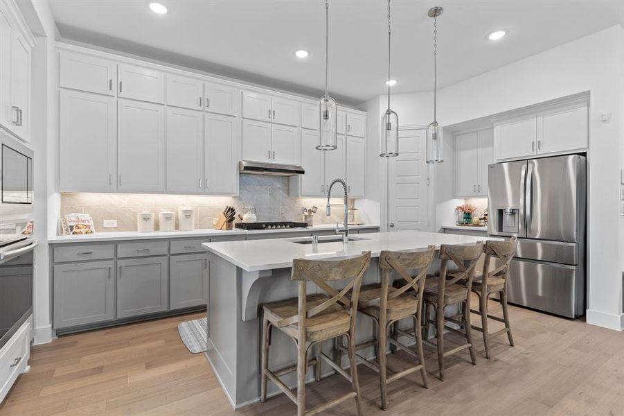 Designed with the chef in the family in mind, this kitchen blends striking beauty with serious functionality. This kitchen is a true culinary command center--warm, welcoming & a favorite place for gathering. Designed with the chef in the family in mind, this kitchen blends striking beauty with serious functionality. This kitchen is a true culinary command center--warm, welcoming & a favorite place for gathering.