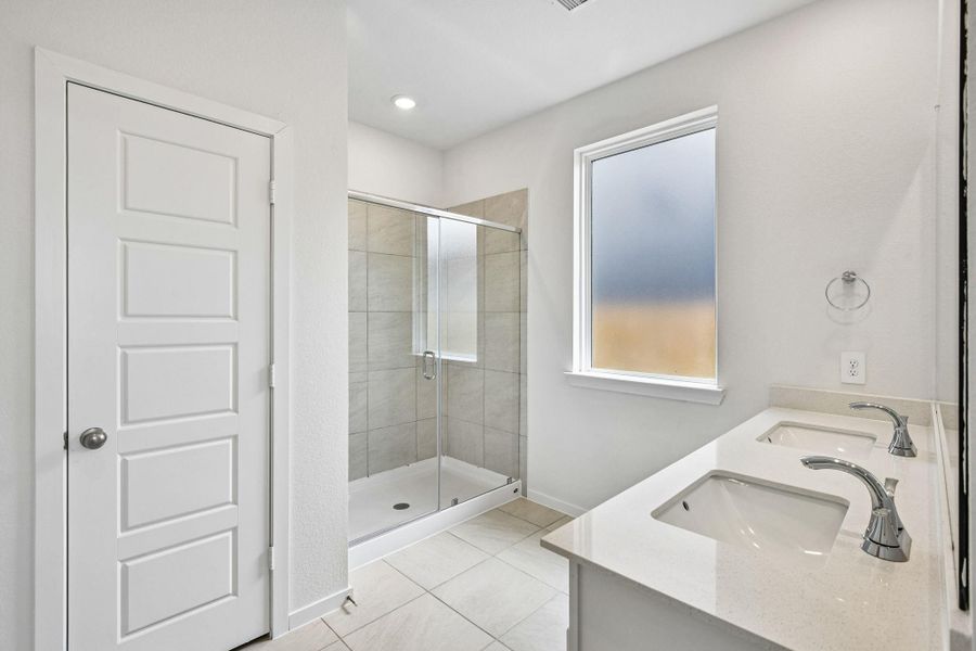 Furnished interior view inside a new home in Riviera Pines - Premier Series, Huffman (Image 13).