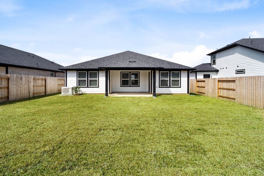Exterior details and patio area of a home in Montgomery Ridge, Montgomery (Image 2).