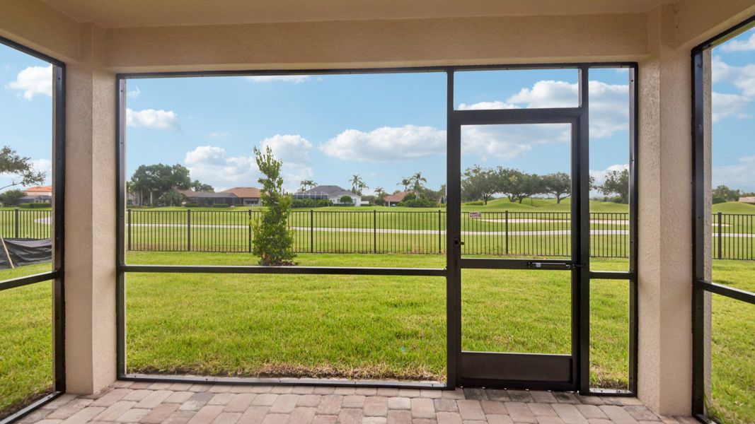 Exterior details and patio area of a home in Grasslands West, Lakeland (Image 3).