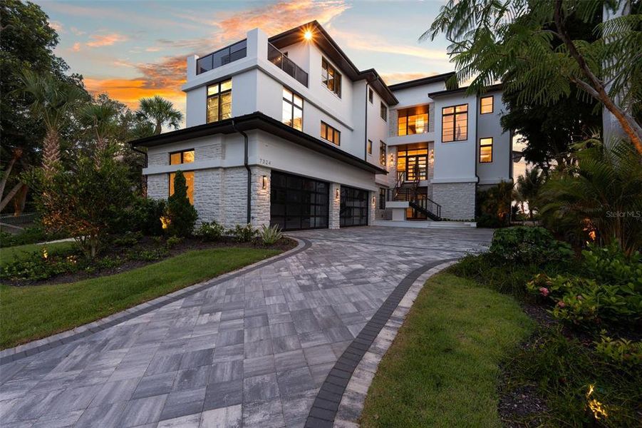Front exterior of a new home in , Sarasota, FL, highlighting curb appeal (Image 21). Front exterior of a new home in , Sarasota, FL, highlighting curb appeal (Image 21).