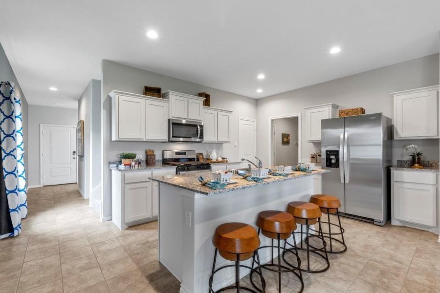 Kitchen- All Home and community information, including pricing, included features, terms, availability and amenities, are subject to change at any time without notice or obligation. All Drawings, pictures, photographs, video, square footages, floor plans, elevations, features, colors and sizes are approximate for illustration purposes only and will vary from the homes as built.