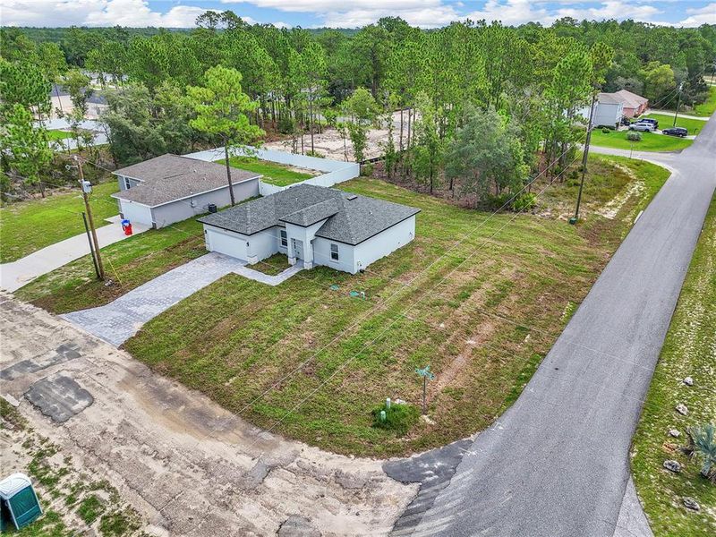 Front exterior of a new home in , Citrus Springs, FL, highlighting curb appeal (Image 18).