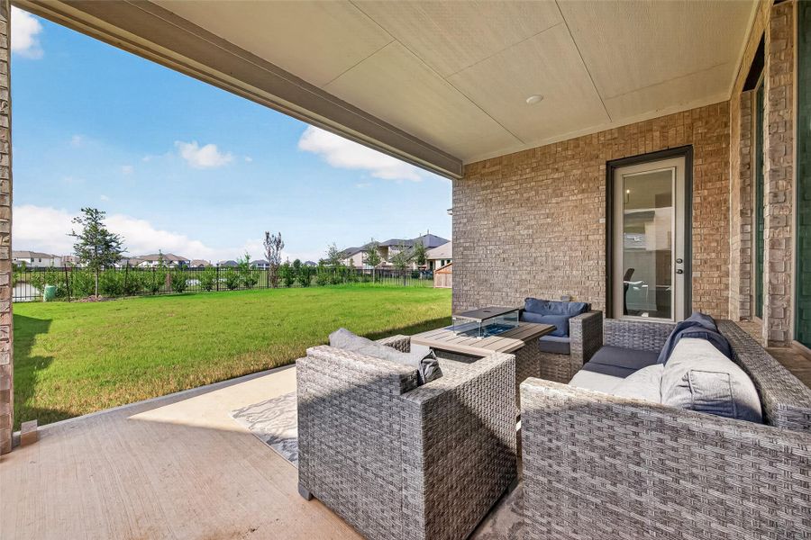 Exterior details and patio area of a home in , Brookshire (Image 24).